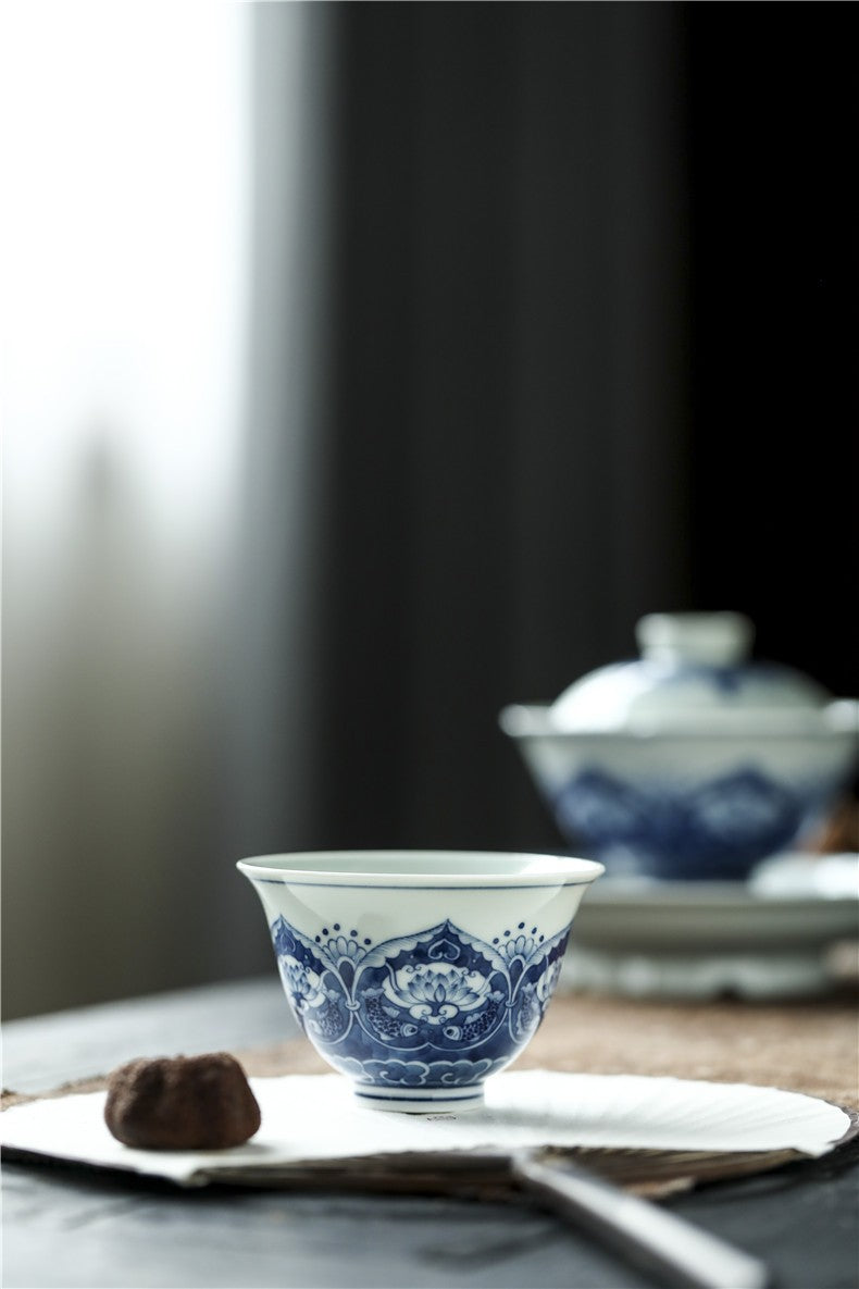 Antique-Style Hand-Painted Wood-Fired Blue & White Teacup – Fish & Lotus Motif