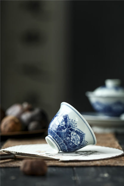 Antique-Style Hand-Painted Wood-Fired Blue & White Teacup – Fish & Lotus Motif
