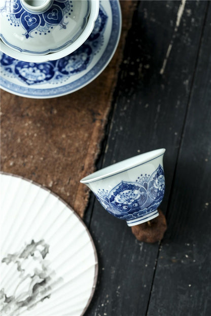 Antique-Style Hand-Painted Wood-Fired Blue & White Teacup – Fish & Lotus Motif