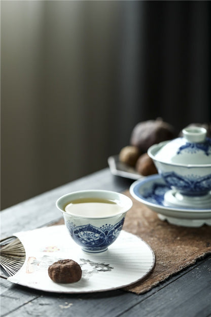 Antique-Style Hand-Painted Wood-Fired Blue & White Teacup – Fish & Lotus Motif