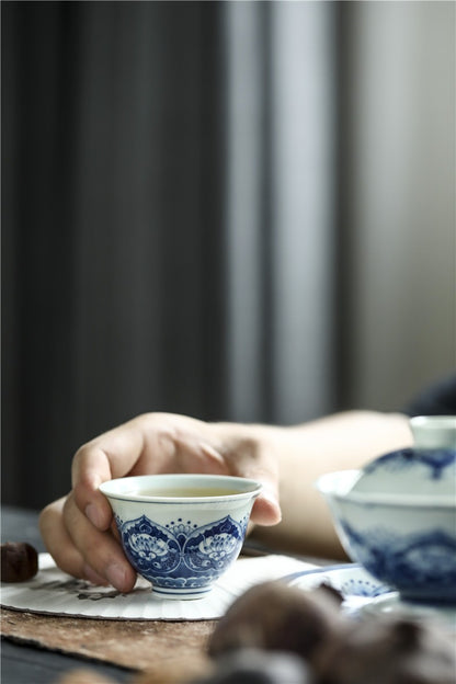 Antique-Style Hand-Painted Wood-Fired Blue & White Teacup – Fish & Lotus Motif