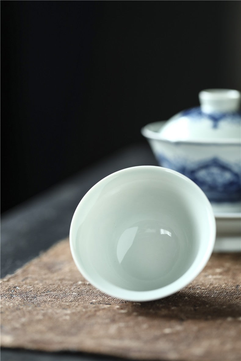 Antique-Style Hand-Painted Wood-Fired Blue & White Teacup – Fish & Lotus Motif