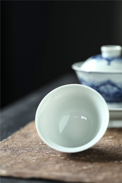 Antique-Style Hand-Painted Wood-Fired Blue & White Teacup – Fish & Lotus Motif