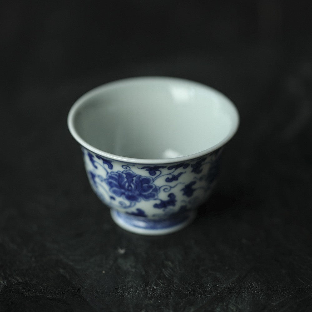 Antique-Style Hand-Painted Blue & White Teacup – Interlocking Peony Motif