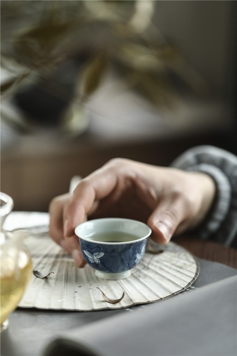 Antique-Style Hand-Painted Blue & White Teacup – Butterfly Motif