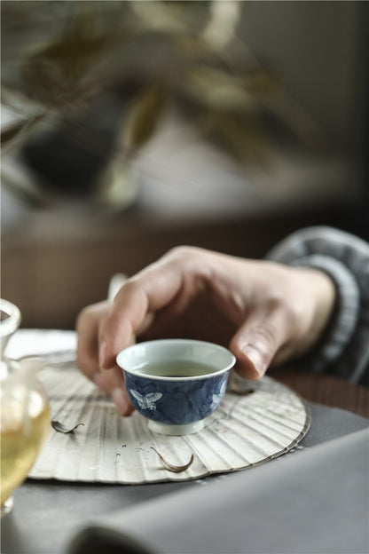 Antique-Style Hand-Painted Blue & White Teacup – Butterfly Motif