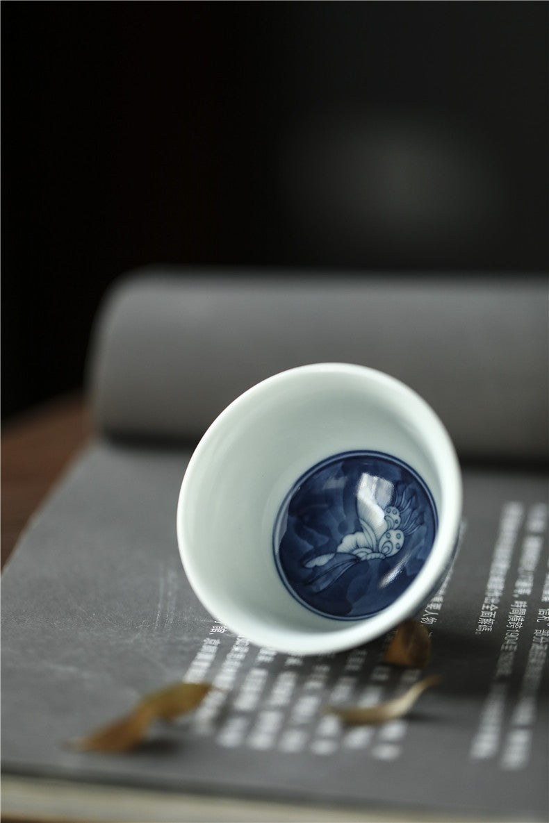 Antique-Style Hand-Painted Blue & White Teacup – Butterfly Motif
