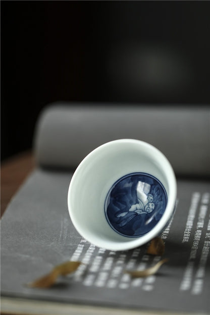 Antique-Style Hand-Painted Blue & White Teacup – Butterfly Motif