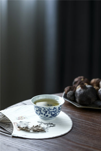 Jingdezhen Antique-Style Hand-Painted Blue & White Teacup – Stippled Dragon & Floral Motif