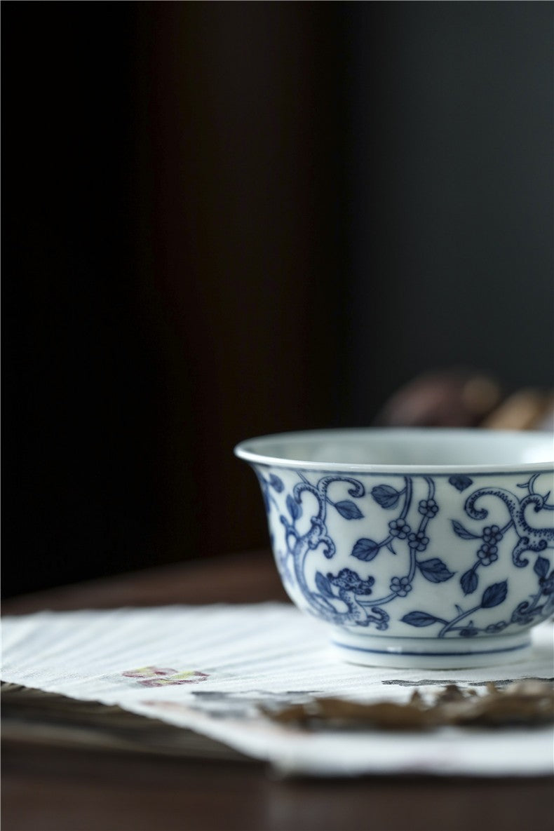 Jingdezhen Antique-Style Hand-Painted Blue & White Teacup – Stippled Dragon & Floral Motif