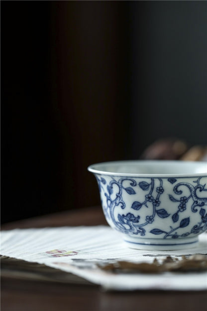 Jingdezhen Antique-Style Hand-Painted Blue & White Teacup – Stippled Dragon & Floral Motif