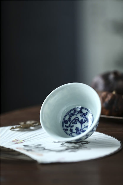 Jingdezhen Antique-Style Hand-Painted Blue & White Teacup – Stippled Dragon & Floral Motif