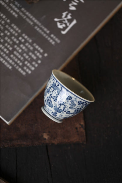 Jingdezhen Antique-Style Hand-Painted Wood-Fired Blue & White Ruyi Cup – Full-Coverage Bats & Gourds Motif