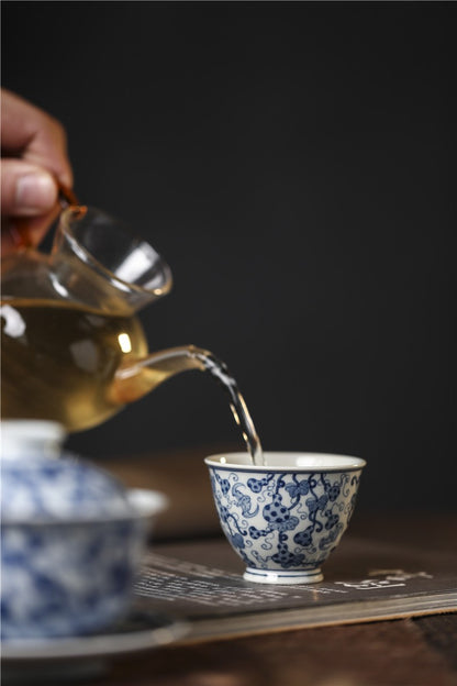 Jingdezhen Antique-Style Hand-Painted Wood-Fired Blue & White Ruyi Cup – Full-Coverage Bats & Gourds Motif