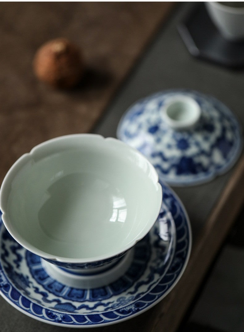Antique-Style Hand-Painted Wood-Fired Blue & White Sancai Gaiwan – Double Fish & Miscellaneous Treasures Motif