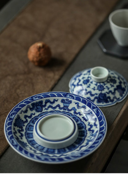 Antique-Style Hand-Painted Wood-Fired Blue & White Sancai Gaiwan – Double Fish & Miscellaneous Treasures Motif